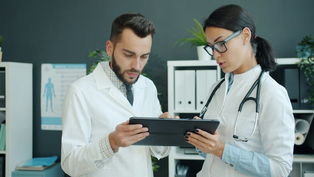 Healthcare professionals using digital technology for growth strategy